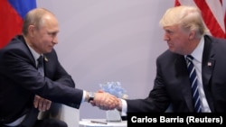 Владимир Путин и Дональд Трамп на саммите G20 в Гамбурге. 7 июля 2018 года