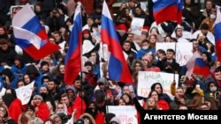 В России на московском стадионе "Лужники" состоялся митинг-концерт по поводу восьмой годовщины аннексии Крымского полуострова