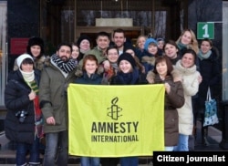 Абдусами Раҳмонов Amnesty International фаоллари билан