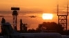 Kazakhstan-A plane descends before landing at an airport during sunrise in Almaty, Kazakhstan May 14, 2020. REUTERS/Pavel Mikheyev